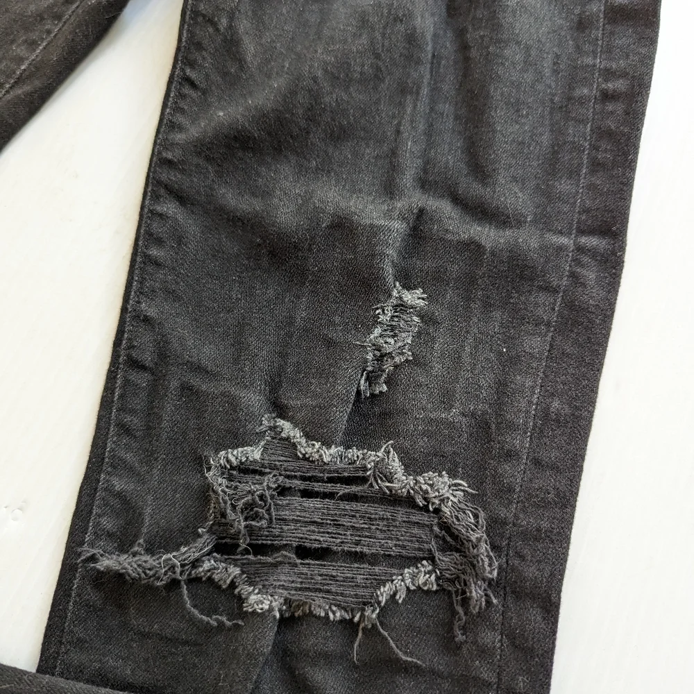 AMERICAN EAGLE Airflex ripped distressed black denim skinny jeans
